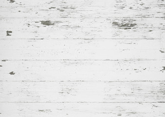 Old weathered wood surface with long boards lined up. Wooden planks on a wall or floor with grain and texture. Light neutral flat faded tones.