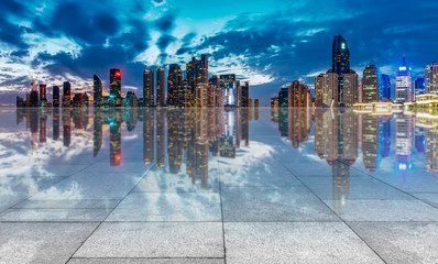 City skyscrapers and square slate ground