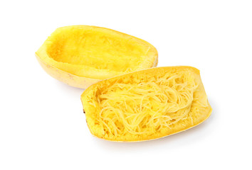 Cooked cut spaghetti squash on white background