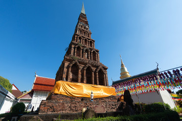 Beautiful pagoda Made of brick with thai Lamp in Thailand temple in Lantern Festival
