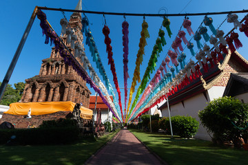 Beautiful pagoda Made of brick with thai Lamp in Thailand temple in Lantern Festival
