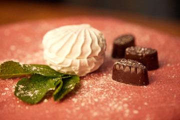 Appetizing sweets on a wooden background. Beautiful background for food
