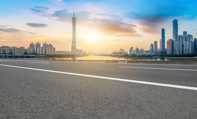 City skyscrapers and road asphalt pavement