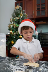 Boy making cookies