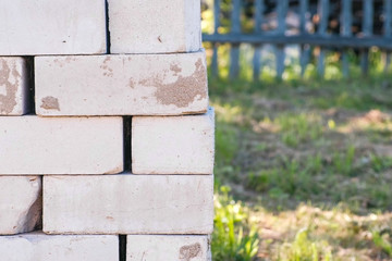 Pallet of bricks close-up for building a house in the country