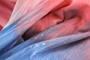 Rainbow Coloured Tie Dyed Fabric Background with Soft Focus