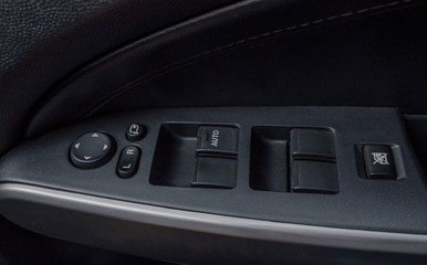 Auto window button control inside driver place.