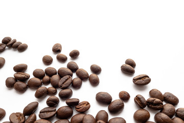 Roasted coffee beans on white background.