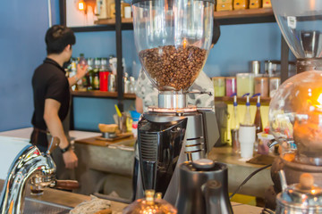 The atmosphere in a cafe with automatic coffee grinder and coffee maker equipment