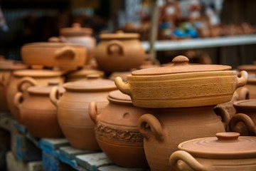 Clay pots and vases, wine bottles, Souvenirs of Georgia. Vase in the form of a grenade, tourist Souvenirs, handmade pottery on sale