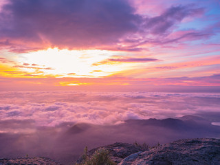 Beautiful Sunrise Sky with Sea of the mist of fog in the morning on Khao Luang mountain in Ramkhamhaeng National Park,Sukhothai province Thailand