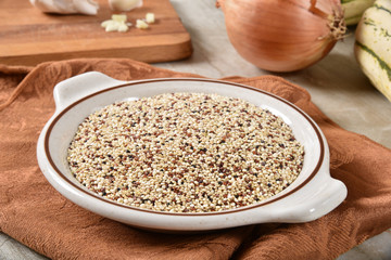 bowl of uncooked organic quinoa