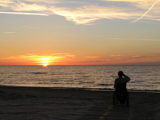 silhouette of man on the beach