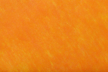 bright orange background of felt fabric. Texture of woolen textile