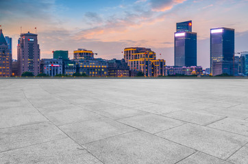 City skyscrapers and square slate ground