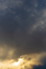 Clouds after rain before sunset as a background