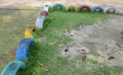 Fototapeta premium colorful Tire toy Recycle in school playground at thailand