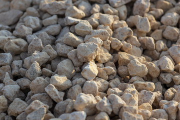 White gravel on a construction site as an abstract background