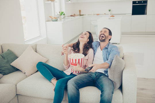 Portrait of nice stylish cheerful girl and guy wearing denim jea