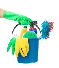 Woman holding bucket with cleaning supplies on white background © Pixel-Shot