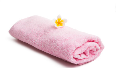 Obraz na płótnie Canvas frangipani on a pink towel