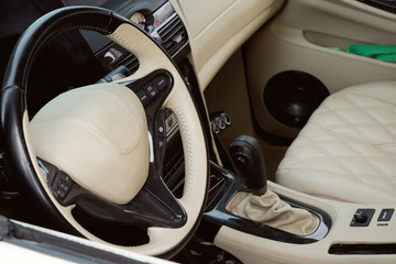 Image of the interior of an old car.
