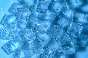 Ice cubes on color background