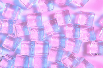Ice cubes on color background