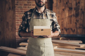 Closeup photo of little small beautiful wooden square with metal