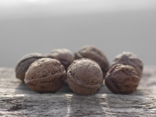 walnuts on wood background