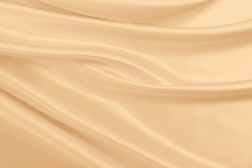 Smooth elegant golden silk or satin luxury cloth texture as wedding background. Luxurious background design. In Sepia toned. Retro style