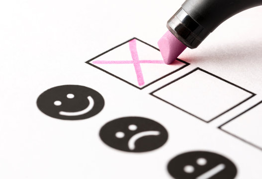 Experience survey, employee feedback questionnaire or business poll concept. Happy person giving positive rating and review with smiling face. Customer loyalty and trust. Check box and marker pen.
