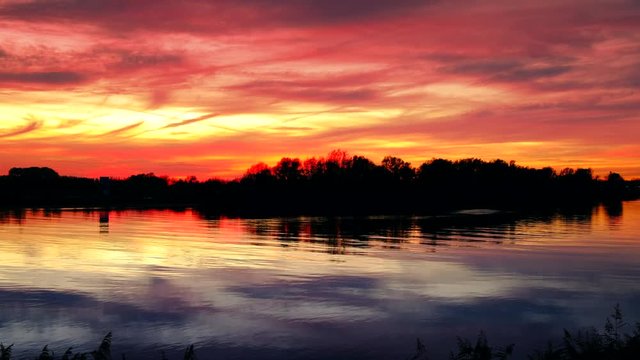 Majestic sunset over the river IJssel during a beautiful autumn evening