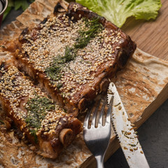Roasted pork ribs with seasame and spicy sauce.  Bbq pork ribs. Closeup