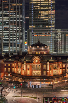 Night view of Marunouchi side of Tokyo railway station in the Chiyoda City, Tokyo, Japan.  The station is divided into Marunouchi and Yaesu sides in its directional signage.