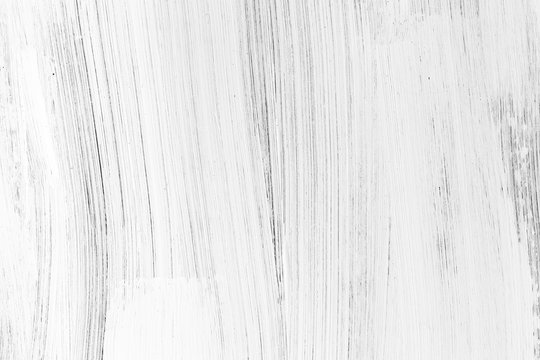 White wooden wall, vertical brush strokes