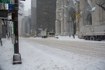 New York City blizzard of 23rd January 2016 showing streets covered in snow with snow plough but no...