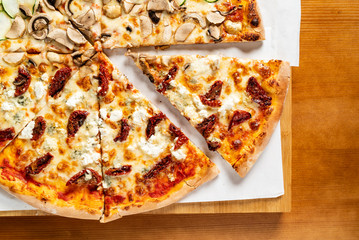 tasty pizza on table