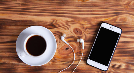 coffee smartphone and headphones