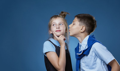 the guy kisses the girl on the cheek