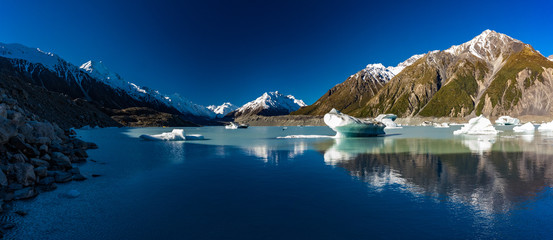 Tasman Glacier Lake with icebergs and mountains, Aoraki Mount Cook National Park, New Zealand