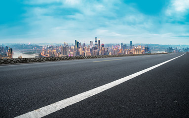 City skyscrapers and road asphalt pavement