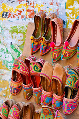 Traditional juttis at an Indian street vendor's stall