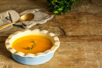 pumpkin soup (orange sweet potatoes). Healthy food. Copy space. Top view