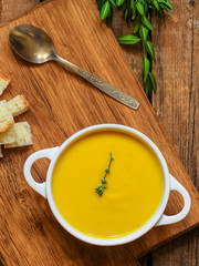 pumpkin soup (orange sweet potatoes). Healthy food. Copy space. Top view