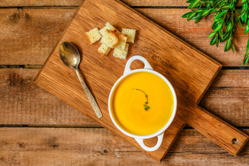 pumpkin soup (orange sweet potatoes). Healthy food. Copy space. Top view