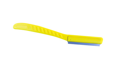 Yellow plastic eyebrow razor makeup isolated on white background with clipping path