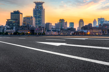 City skyscrapers and road asphalt pavement