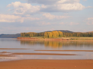Autumn beach, river. Russian autumn nature. Russia, Ural, Perm region