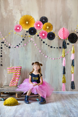 Cute beautifull girl lady posing in fancy violet dress skirt with number seven celebrating her...